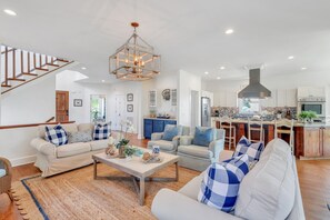 Family room that opens up to kitchen and dining room