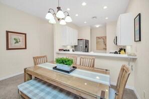 Spacious and inviting living room, perfect for gathering with family after a day exploring Orlando’s attractions.