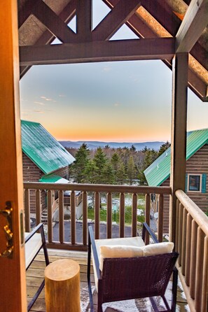 Multiple porches and windows with sunset views