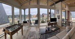 Great room with floor to ceiling windows