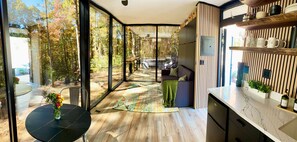 Blur the line between indoors and outdoors. Floor-to-ceiling windows frame the perfect view. 