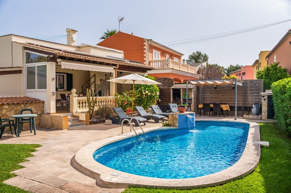 House with pool near the sea.