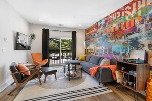 Cozy living room with plenty of seating, records to listen to and smart TV. 