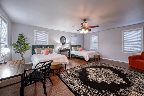 Maximizes comfort with two beds for restful nights and dedicated study desk.