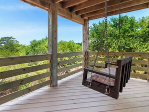 Mid level deck with swing