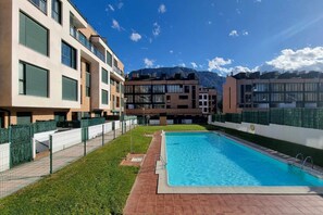 Property building,Facade/entrance,Pool view,Swimming pool