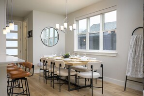 Seating For up to 8 at the Luxurious Custom Wood Table