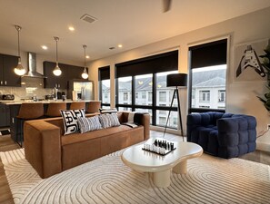 Luxury Open Floor Plan - Floor-to-ceiling windows with views of Nashville. 