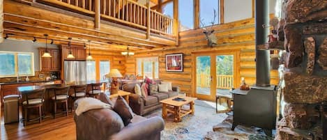 The spacious home boasts a welcoming mountain cabin style with an open and social layout and impressive views towards Breckenridge Ski Resort.