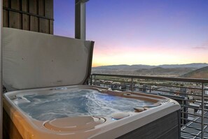 Relax in your private hot tub with a view!