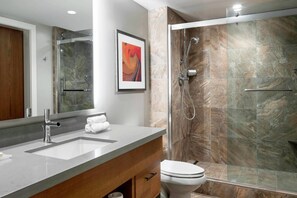 Primary Bathroom features a walk-in shower and single vanity.