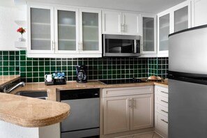 Full Kitchen with all the necessities to cook a meal.