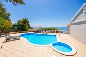 Private pool and terrace with panoramic sea views