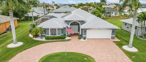 Stunning home with spacious driveway and charming curb appeal.