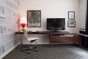 Unit with desk area and a flat-screen TV