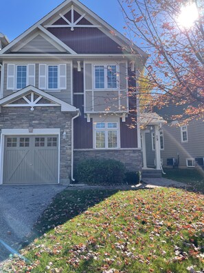 Exterior - parking for 2 cars a single driveway and single garage