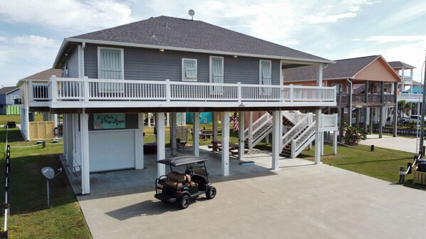 Slip away to Coastal Retreat, just steps away from the beach, featuring 3 bedrooms and 3 baths