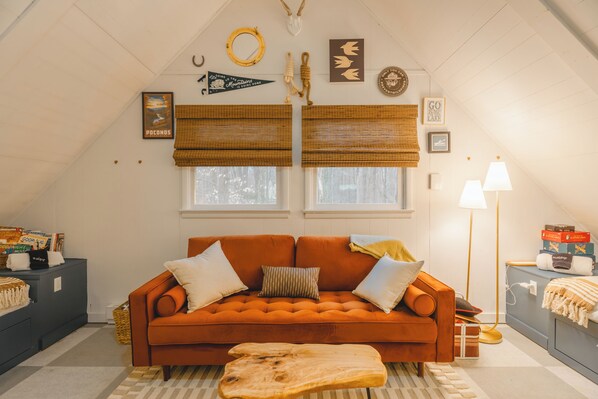 Upstairs, you'll find 4 built in twin beds with individual reading lights, super cozy blankets and outlets for phone-charging at each bunk