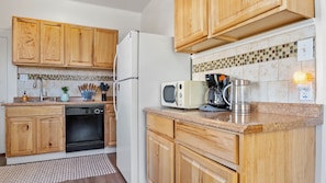 Plenty of Cupboards and Drawers, Coffee Maker, Microwave, and Water Pitcher