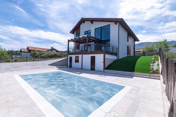 Property building,Balcony/Terrace,Pool view,Swimming pool