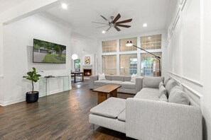 Spacious and cozy living area, perfect for relaxing or catching up on your favorite shows.