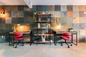 There are 2 desks with chairs providing a laptop-friendly workspace if needed.