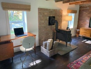 Workspace looks out into front yard.