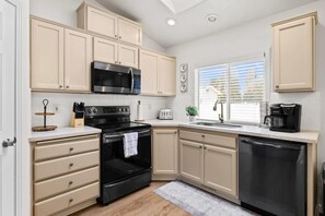 The kitchen is equipped with all cooking essentials and stainless steal appliances.