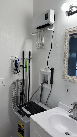 Dryer rack and washer.