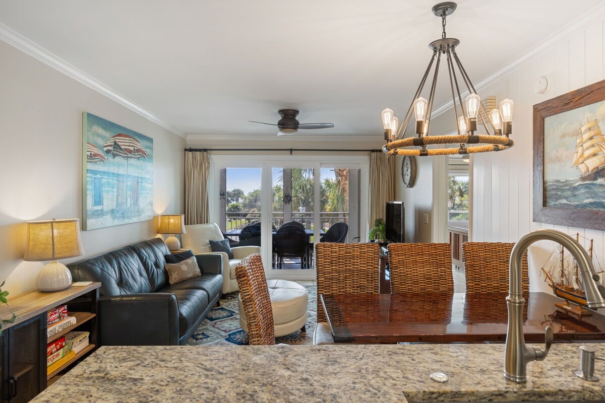 Beach Villa with relaxing patio and steps to all the amenities!