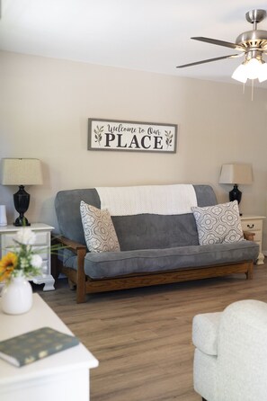Living Room with Queen Size Futon & Thick Mattress