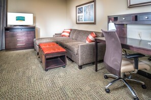 Sink into the cozy sofa after a day exploring the area.