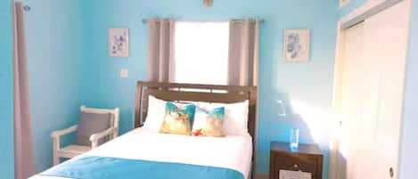 Queen size bed with comfy mattress for a very restful sleep.