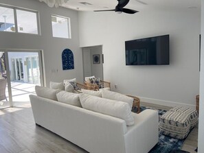 Large sofa with 2 side chairs to gather for evening chats or watching TV