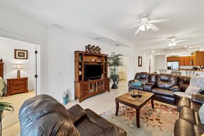 Large, open living room with 48" TV