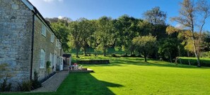 Spacious garden with outside seating and tranquil surroundings