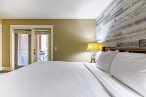 King bed in a lovely bedroom with direct access to the patio