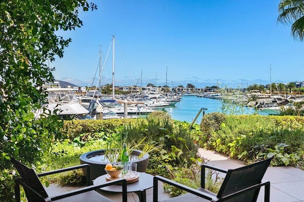 Enjoy an afternoon Aperol, overlooking the stunning terrace gardens and Marina