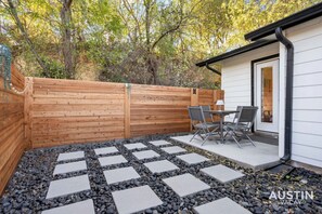 Private patio with dining for four