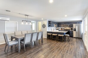 Enjoy the convenience of a connected kitchen and dining area