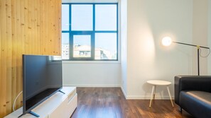 Whether you're sipping coffee by the window or lounging on the sofa, relaxation is guaranteed in our comfortable living area #TV #airbnb
