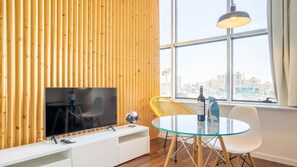 Our studio counts with a dining area for two and a flat screen TV for your entertainment #wonderful #bright