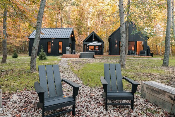 Welcome to your deconstructed villa! Villa Pine featuring four structures - Eat & Play, Heat (Sauna) and two Rest & Refresh, connected by over 900 sqft of decking, including hot tub, fire pit, and EV charging.  