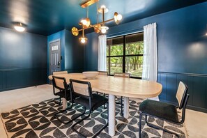 The dining room table seats 8 and is the perfect place for a family meal or a board game night! *There are 2 extra chairs not pictured*