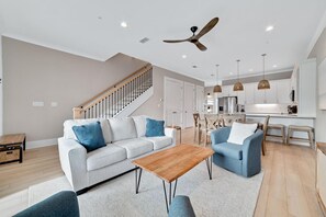 Open floor plan with coastal decor