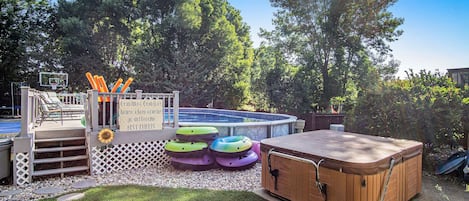 Seasonal pool (heated) and year-round hot tub.