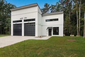 There is ample driveway parking.  The attached garage is used for boat storage and will not be accessible to you (or accessed by others) during your stay.  