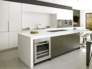 Boiling water tap and wine fridge.