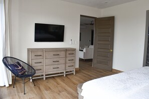 Dresser & nightstands for clothes along with large walk-in closet