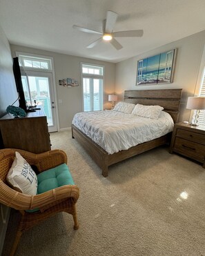 Primary Bedroom, with door to Balcony.